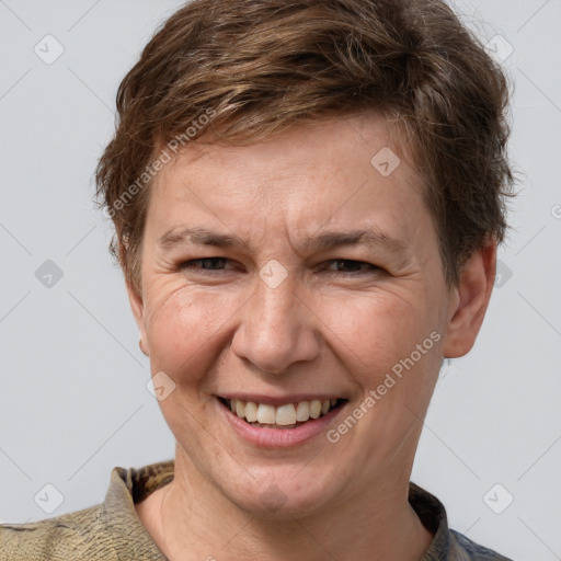 Joyful white adult male with short  brown hair and grey eyes