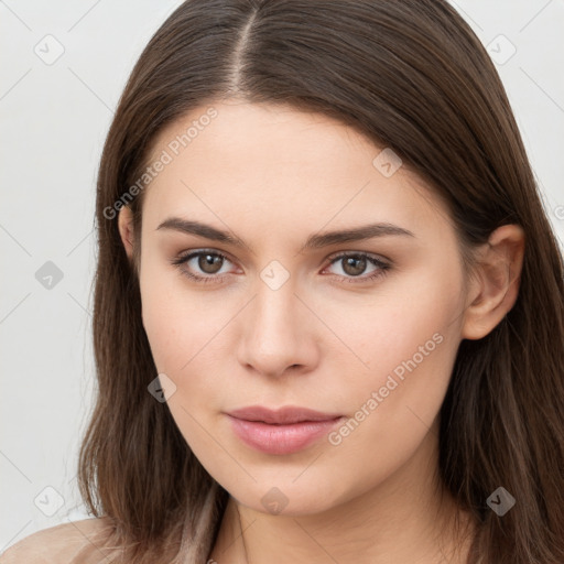 Neutral white young-adult female with long  brown hair and brown eyes