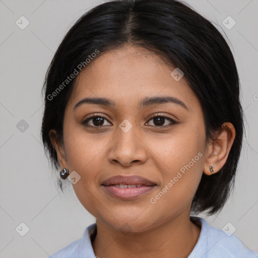 Joyful latino young-adult female with medium  brown hair and brown eyes