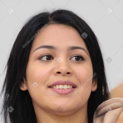 Joyful asian young-adult female with long  brown hair and brown eyes