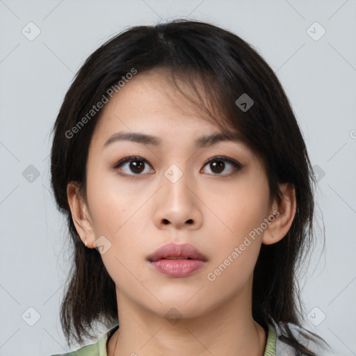 Neutral asian young-adult female with medium  brown hair and brown eyes