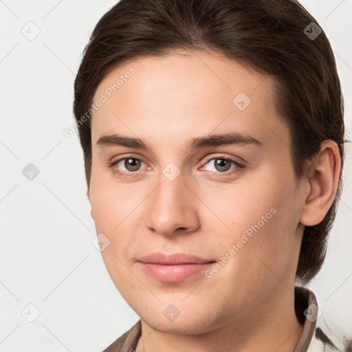 Joyful white young-adult male with medium  brown hair and brown eyes