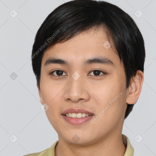 Joyful asian young-adult male with short  black hair and brown eyes