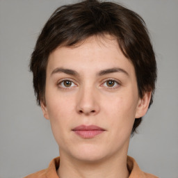 Neutral white young-adult female with medium  brown hair and brown eyes