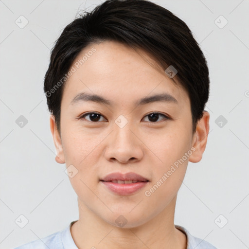 Joyful asian young-adult female with short  brown hair and brown eyes