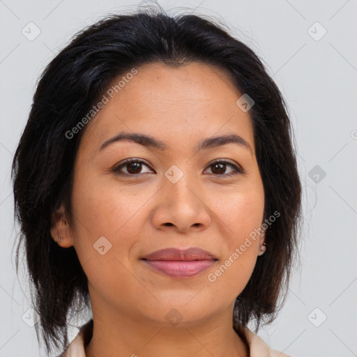 Joyful latino young-adult female with medium  brown hair and brown eyes