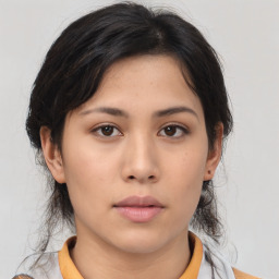 Neutral asian young-adult female with medium  brown hair and brown eyes