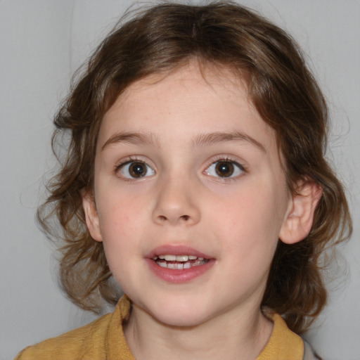 Joyful white child female with medium  brown hair and blue eyes