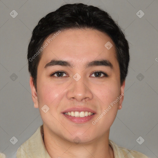 Joyful white young-adult male with short  black hair and brown eyes