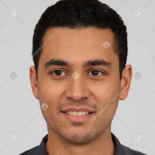 Joyful white young-adult male with short  black hair and brown eyes