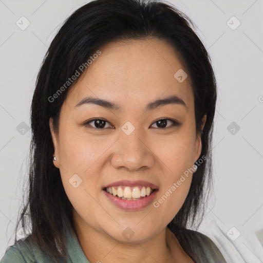 Joyful asian young-adult female with medium  brown hair and brown eyes