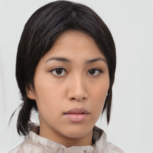 Neutral asian young-adult female with medium  black hair and brown eyes