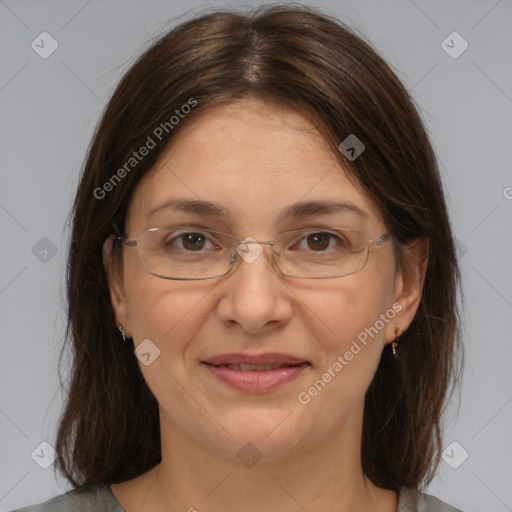 Joyful white adult female with medium  brown hair and grey eyes