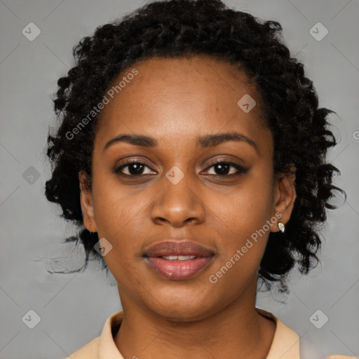 Joyful black young-adult female with medium  black hair and brown eyes