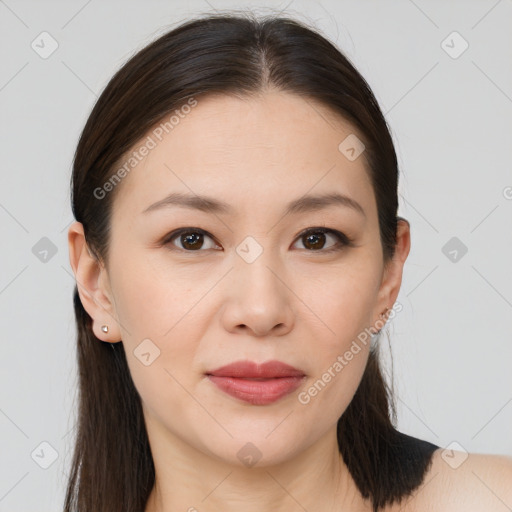 Joyful white young-adult female with long  brown hair and brown eyes