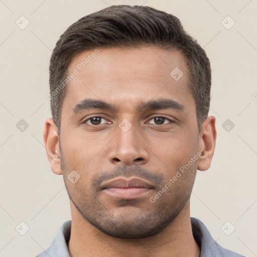 Neutral white young-adult male with short  brown hair and brown eyes