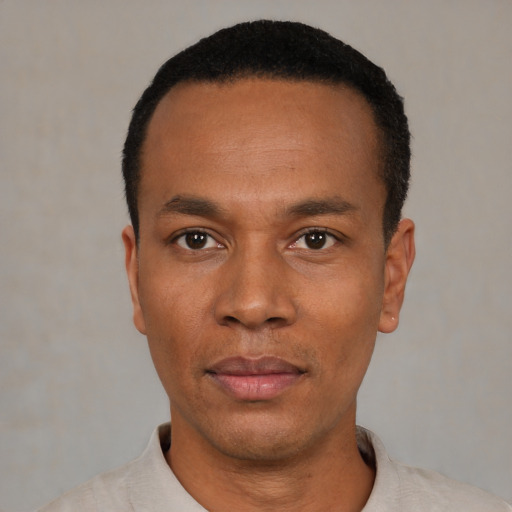 Neutral black young-adult male with short  black hair and brown eyes