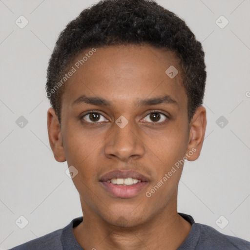 Joyful black young-adult male with short  brown hair and brown eyes