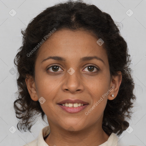 Joyful black young-adult female with medium  brown hair and brown eyes