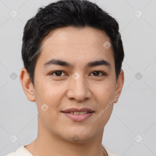 Joyful asian young-adult male with short  brown hair and brown eyes