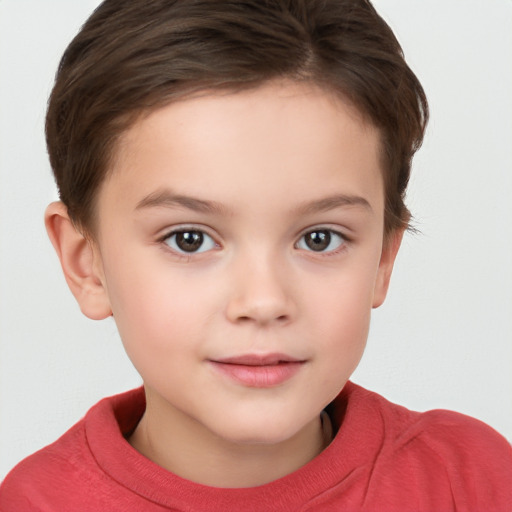 Joyful white child female with short  brown hair and brown eyes