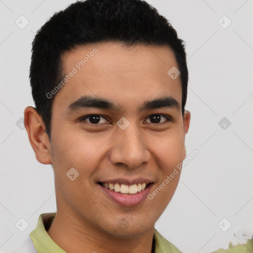 Joyful latino young-adult male with short  brown hair and brown eyes