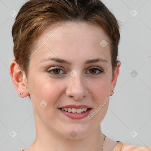 Joyful white young-adult female with short  brown hair and grey eyes