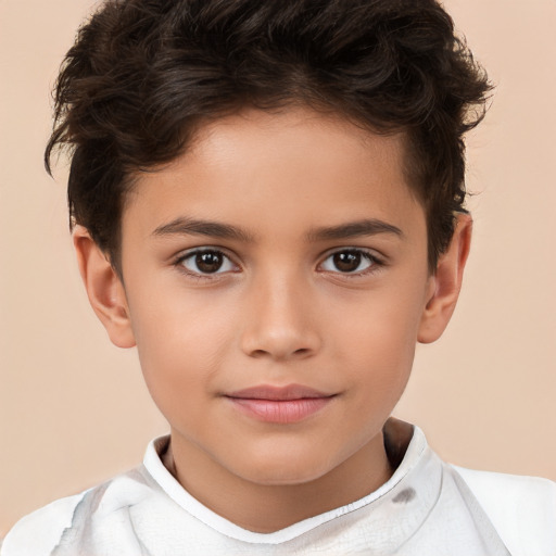 Joyful white child male with short  brown hair and brown eyes