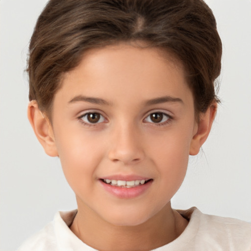 Joyful white child female with short  brown hair and brown eyes