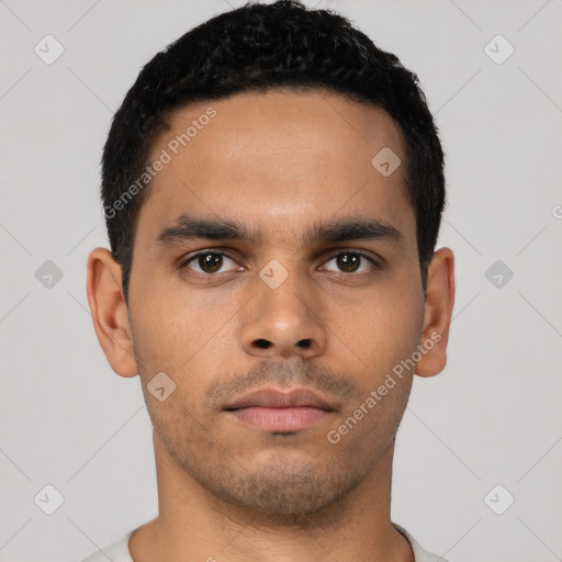 Neutral latino young-adult male with short  black hair and brown eyes