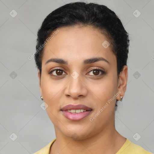 Joyful latino young-adult female with short  brown hair and brown eyes