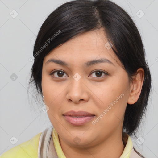 Joyful asian young-adult female with medium  brown hair and brown eyes