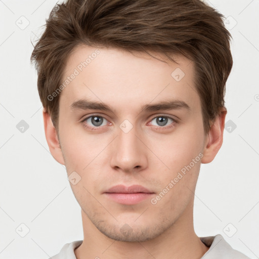 Neutral white young-adult male with short  brown hair and grey eyes