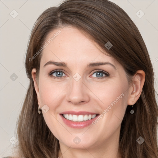 Joyful white young-adult female with long  brown hair and grey eyes