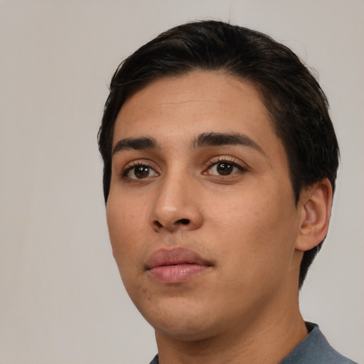 Neutral white young-adult male with short  black hair and brown eyes