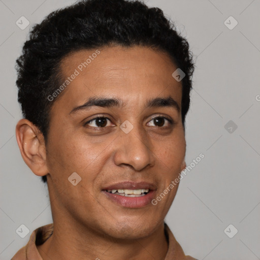 Joyful latino young-adult male with short  brown hair and brown eyes