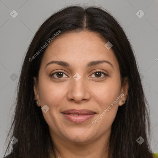 Joyful latino young-adult female with long  brown hair and brown eyes