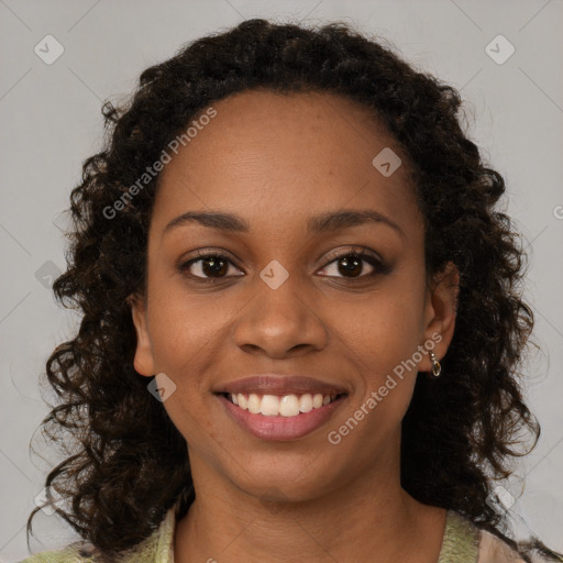 Joyful black young-adult female with medium  brown hair and brown eyes