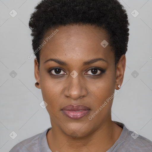 Joyful black young-adult female with short  black hair and brown eyes