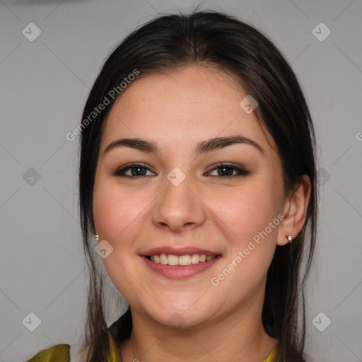 Joyful white young-adult female with medium  brown hair and brown eyes