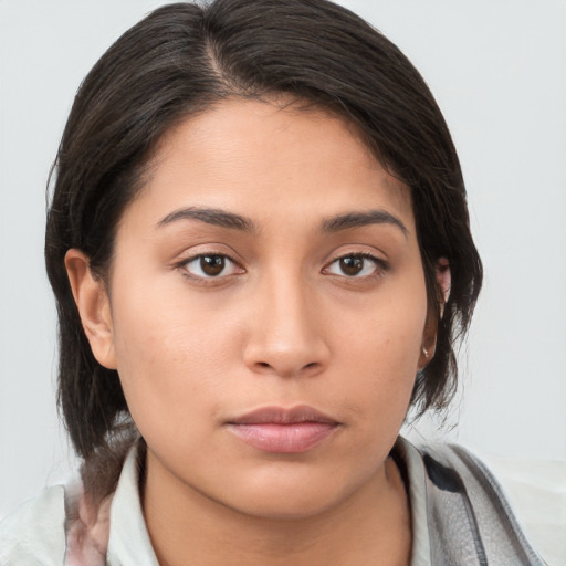 Neutral white young-adult female with medium  brown hair and brown eyes