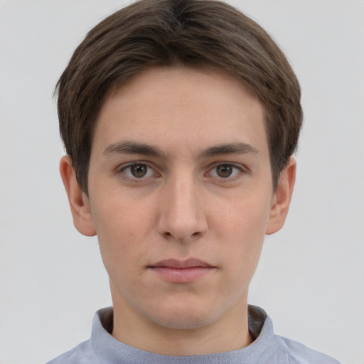 Neutral white young-adult male with short  brown hair and brown eyes