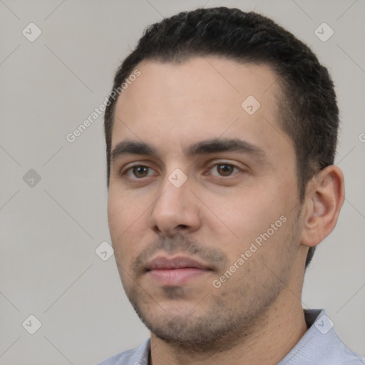 Neutral white young-adult male with short  black hair and brown eyes