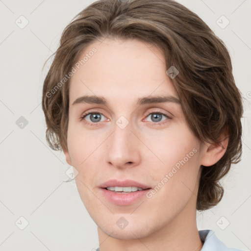 Joyful white young-adult female with medium  brown hair and green eyes