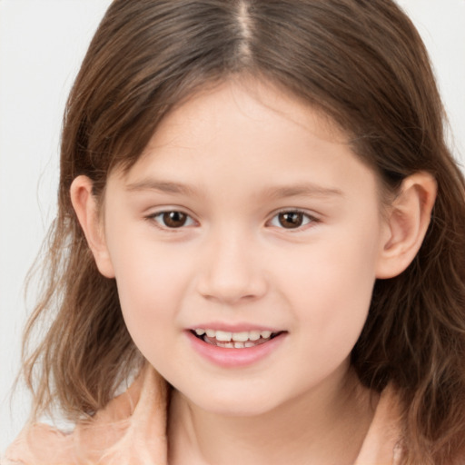 Joyful white child female with medium  brown hair and brown eyes