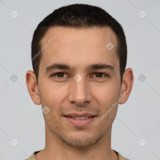 Joyful white young-adult male with short  brown hair and brown eyes