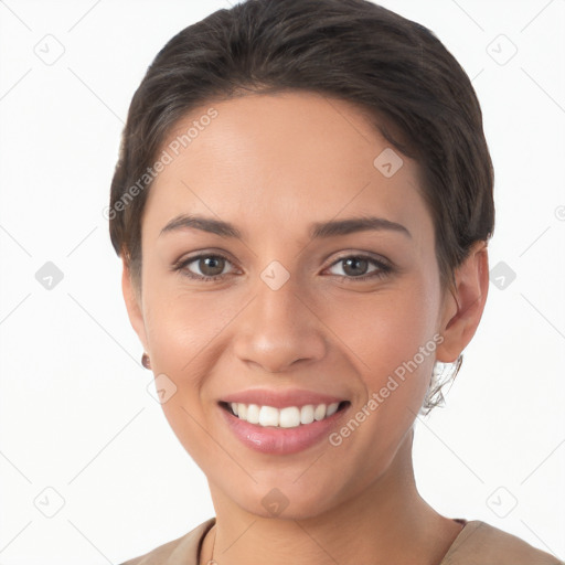 Joyful white young-adult female with short  brown hair and brown eyes