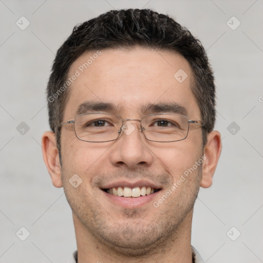 Joyful white adult male with short  brown hair and brown eyes