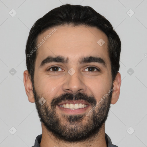 Joyful latino young-adult male with short  black hair and brown eyes