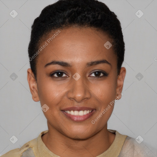 Joyful black young-adult female with short  black hair and brown eyes